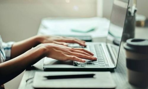 Typing, networking or hands on laptop for internet research, social media content or communication. Tech, email or hand in office planning data analytics for social network, blog review or media app